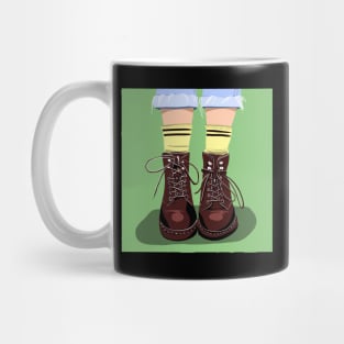 red shoes with socks on a green background Mug